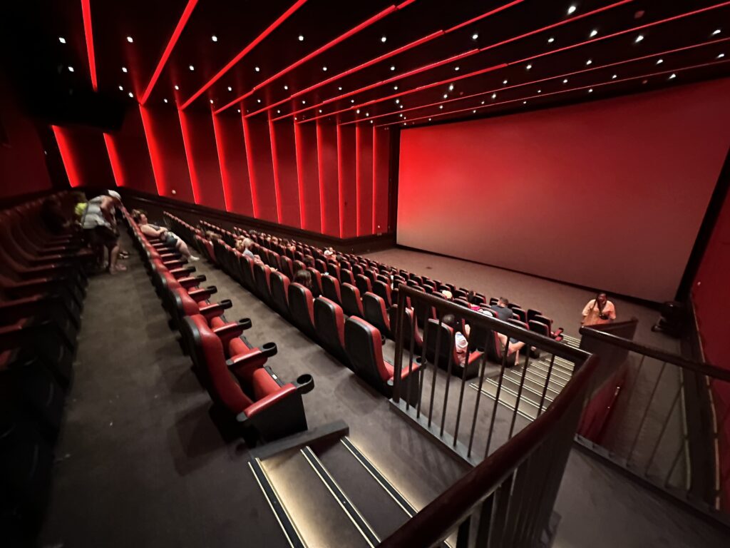 a movie theater with red lights