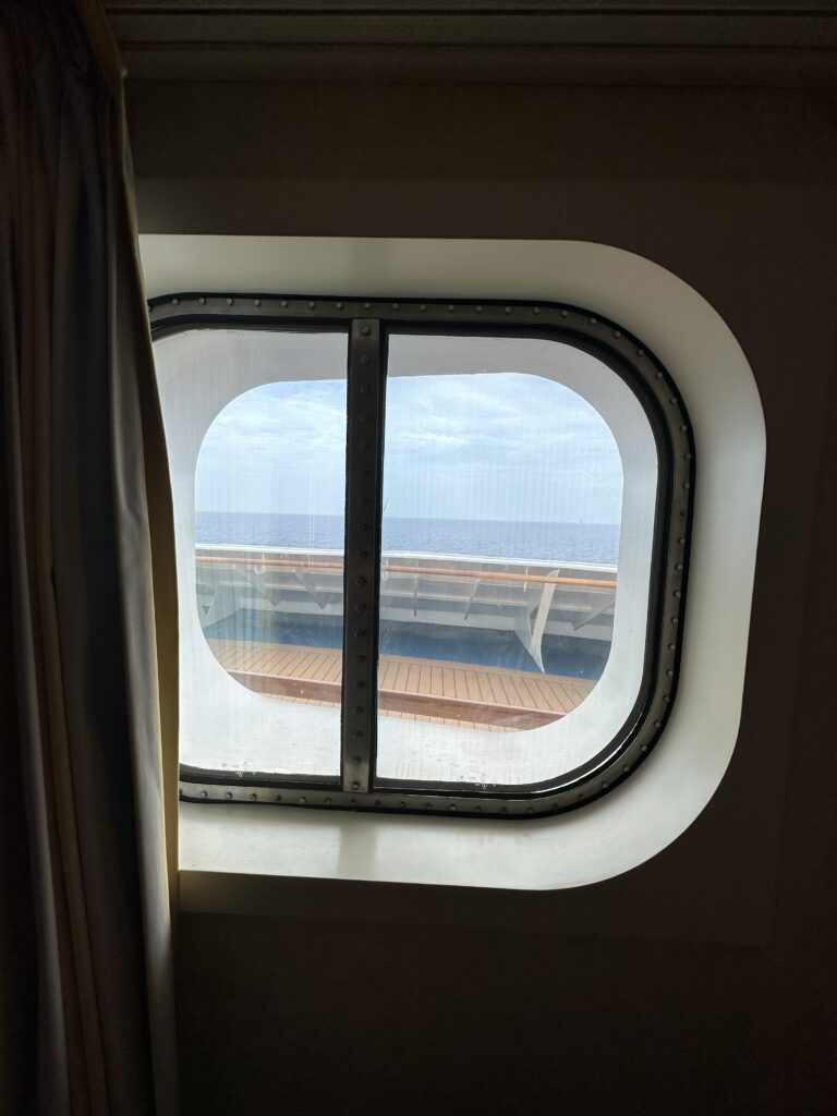 a window with a view of the ocean