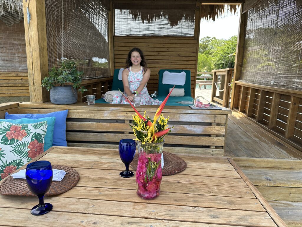 a woman sitting on a deck