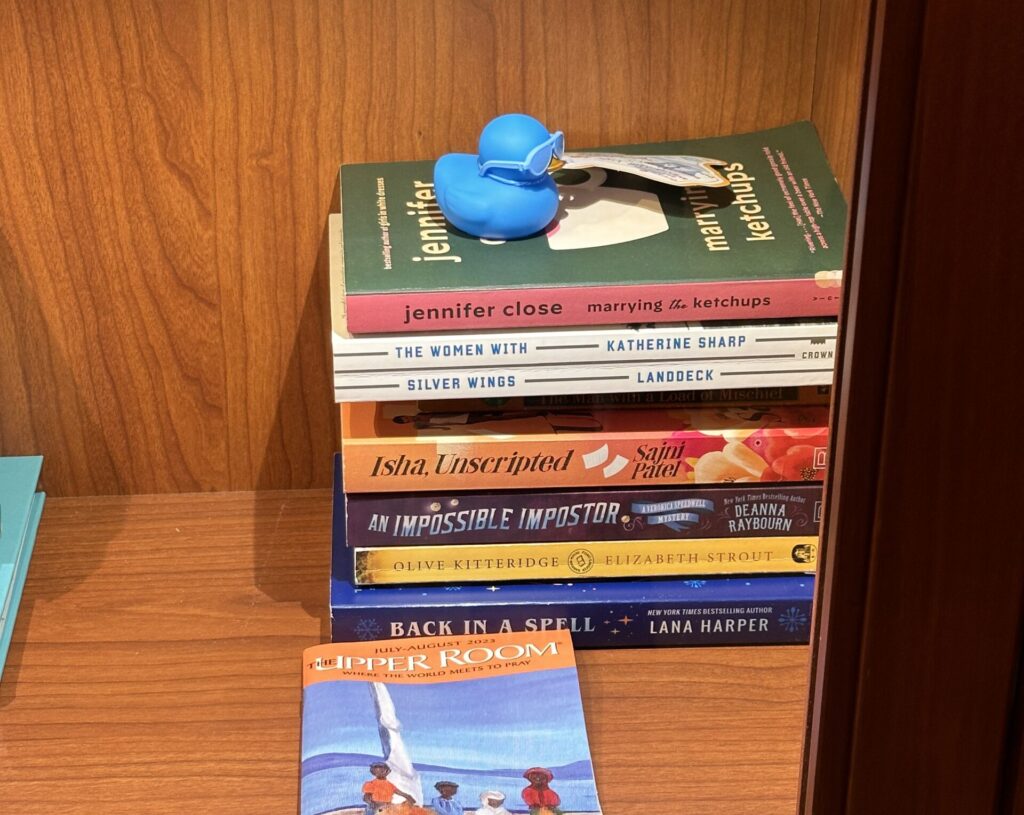 a stack of books on a shelf