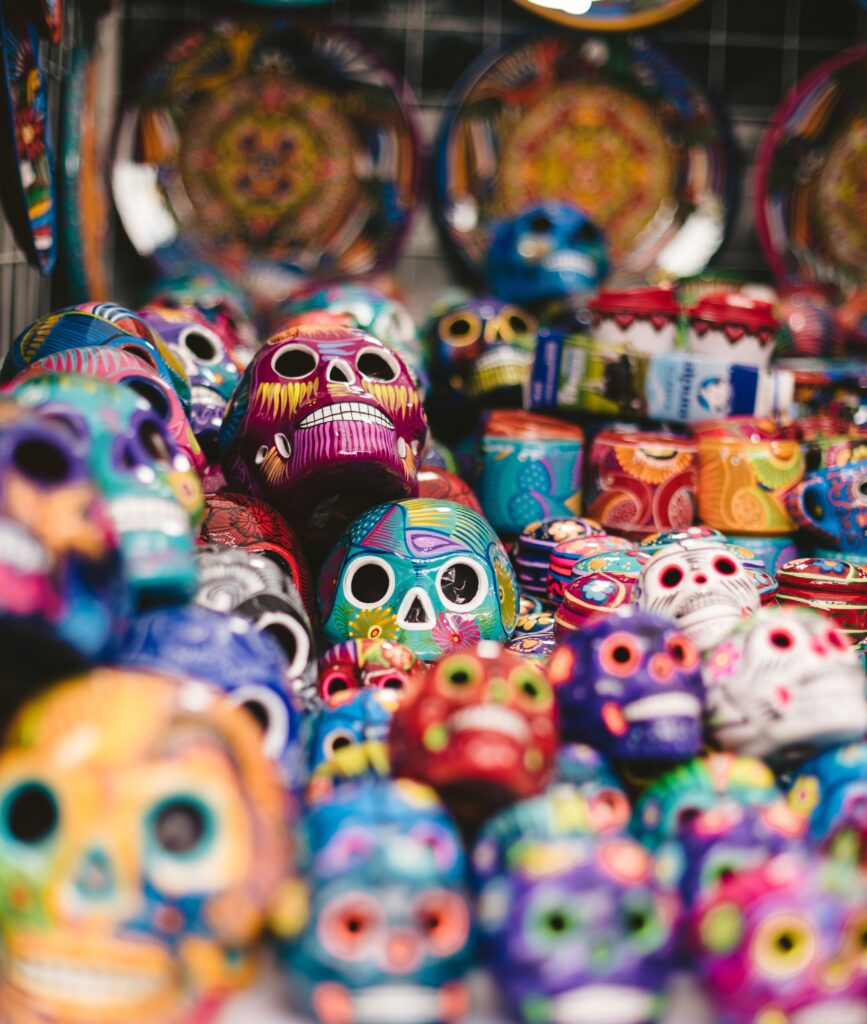 a group of colorful skulls