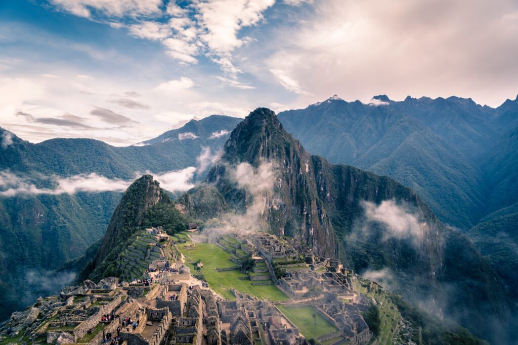 a mountain with a city in the distance