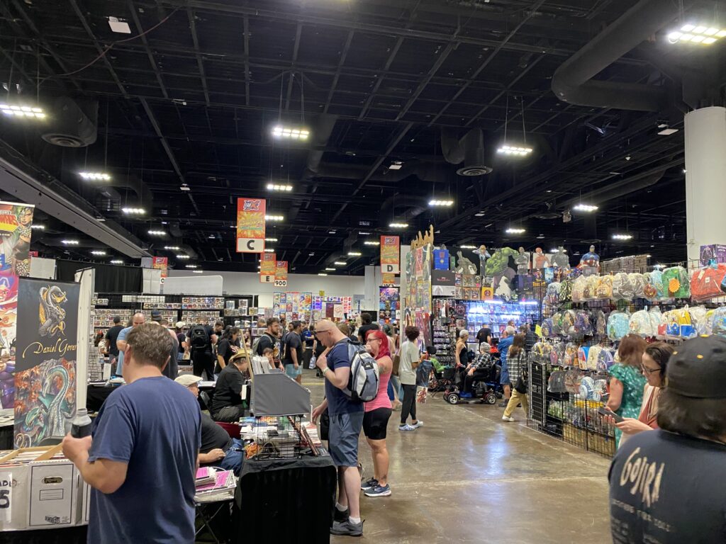a group of people in a room with a large display of toys