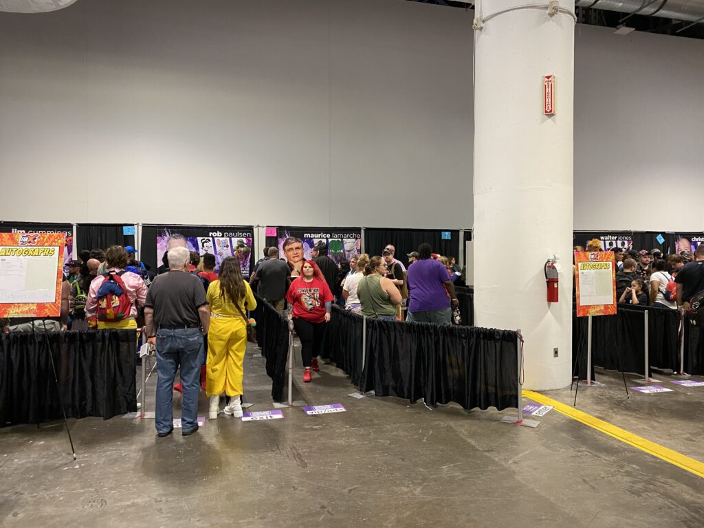 a group of people standing in a line