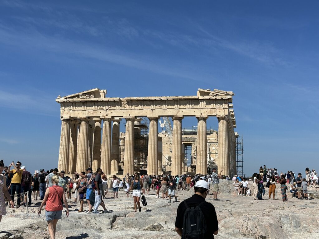 a group of people standing in front of a building