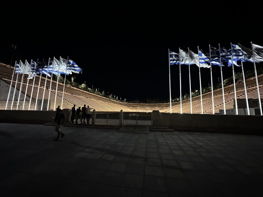 a stadium with flags in the air