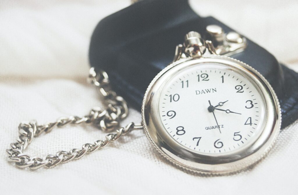 a pocket watch with a chain
