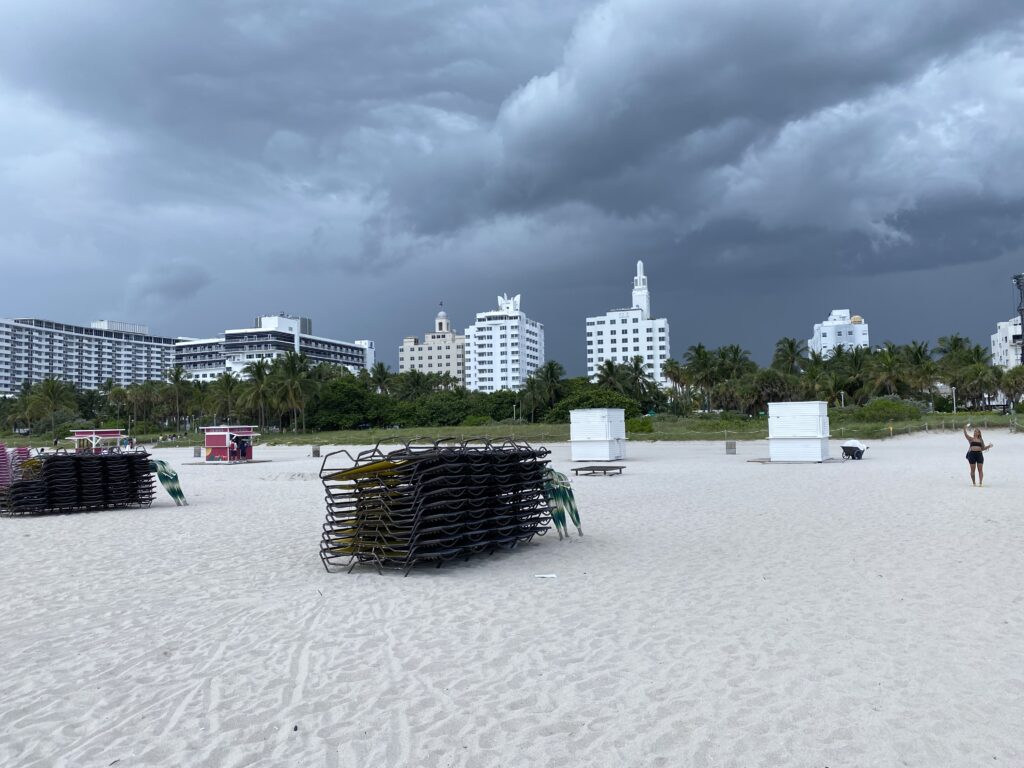 a group of chairs on a beach