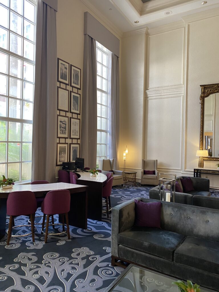 a room with couches and tables