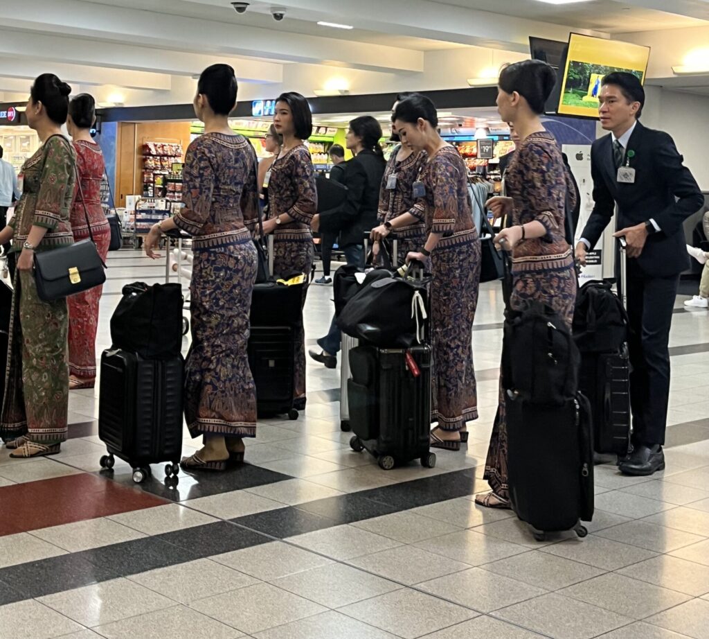 a group of people with luggage