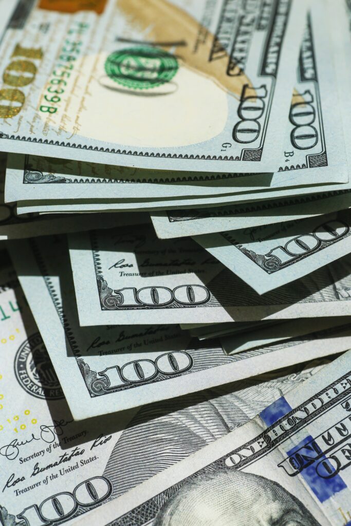 a stack of money on a table