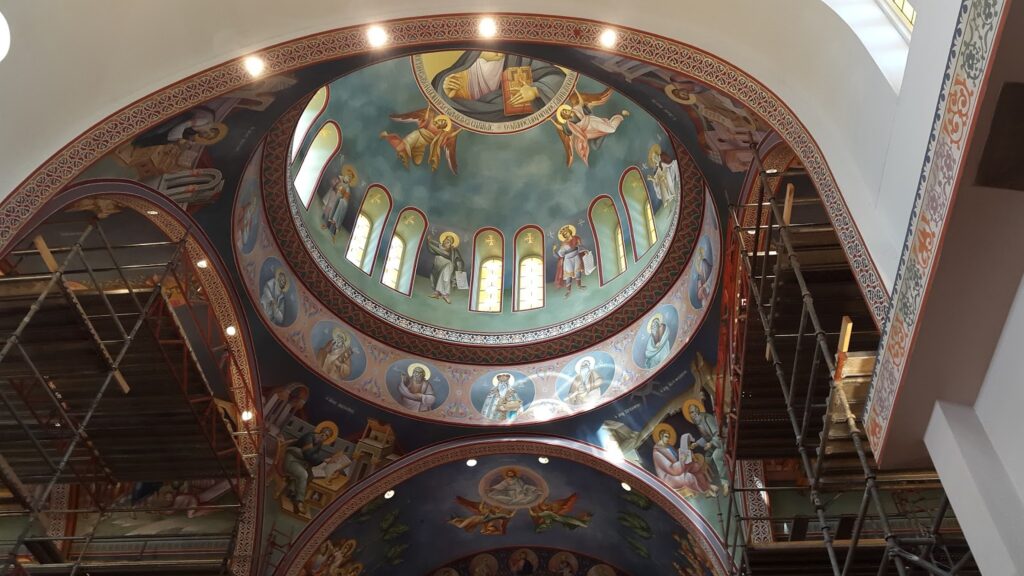 a painting on the ceiling of a building