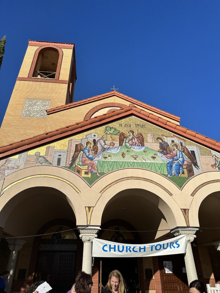 a church with a mural on the side