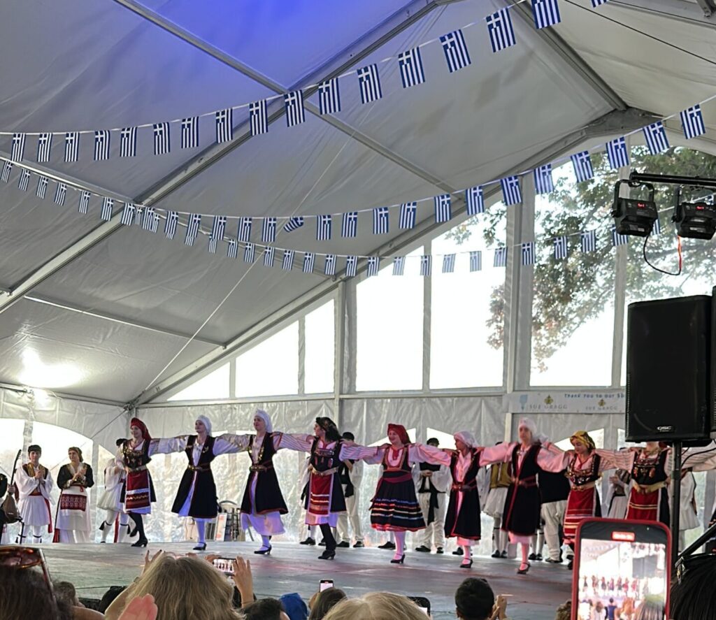 a group of women dancing on a stage