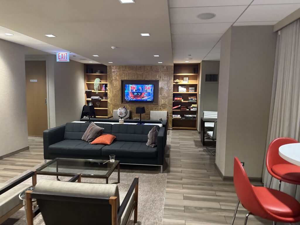 a room with a couch and a tv