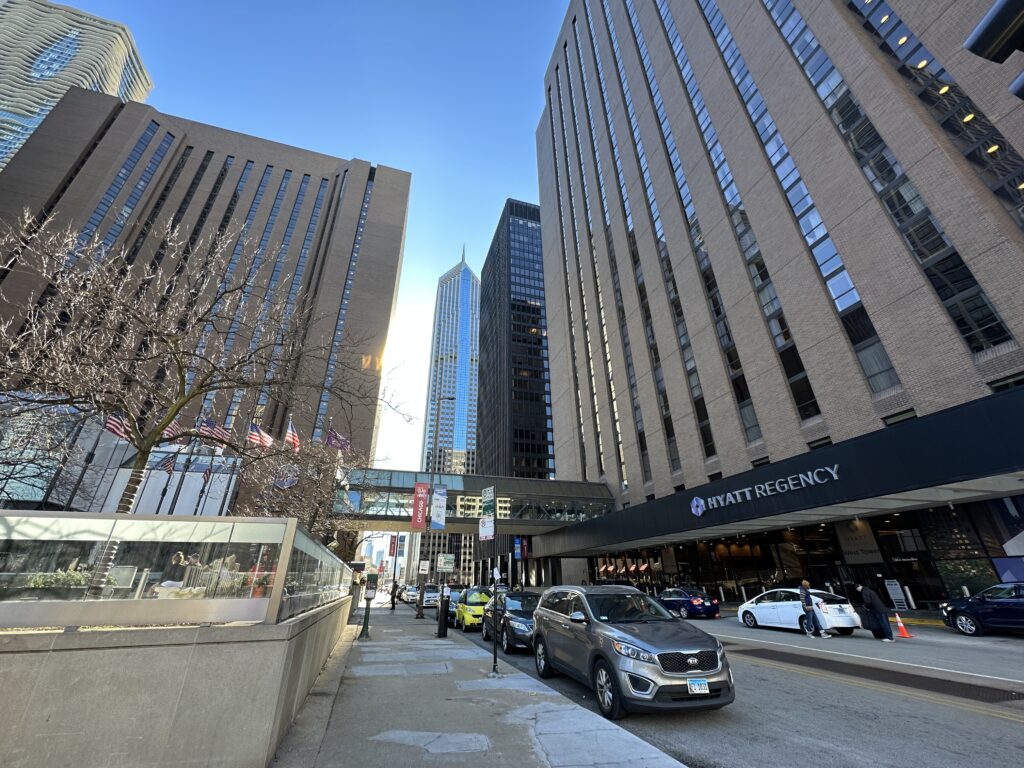 a street with cars and buildings