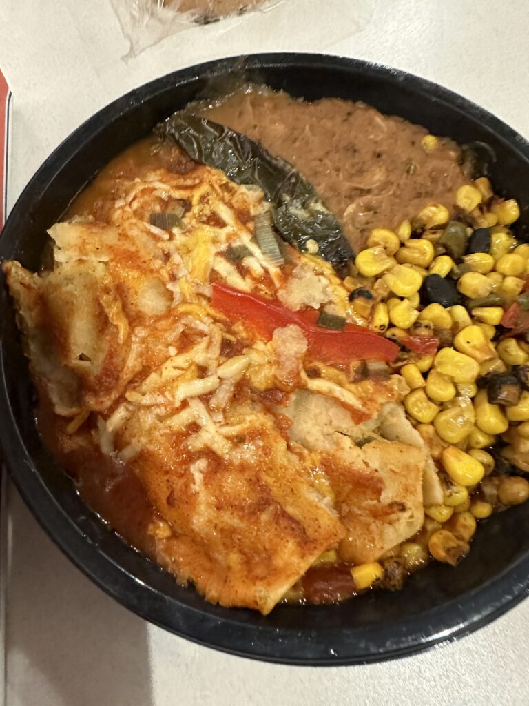 a bowl of food with a fork