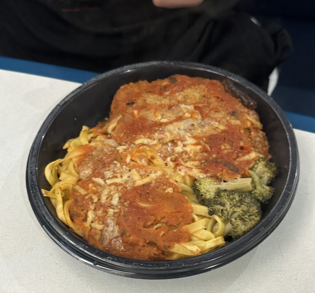 a bowl of pasta and broccoli