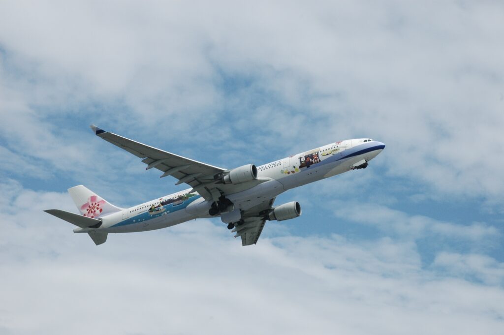 a plane flying in the sky