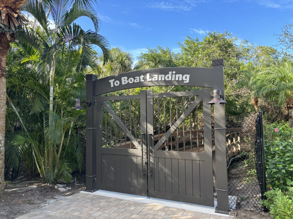 a gate with a sign on it