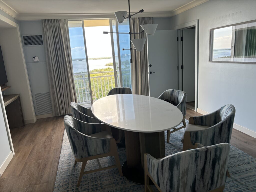 a room with a table and chairs