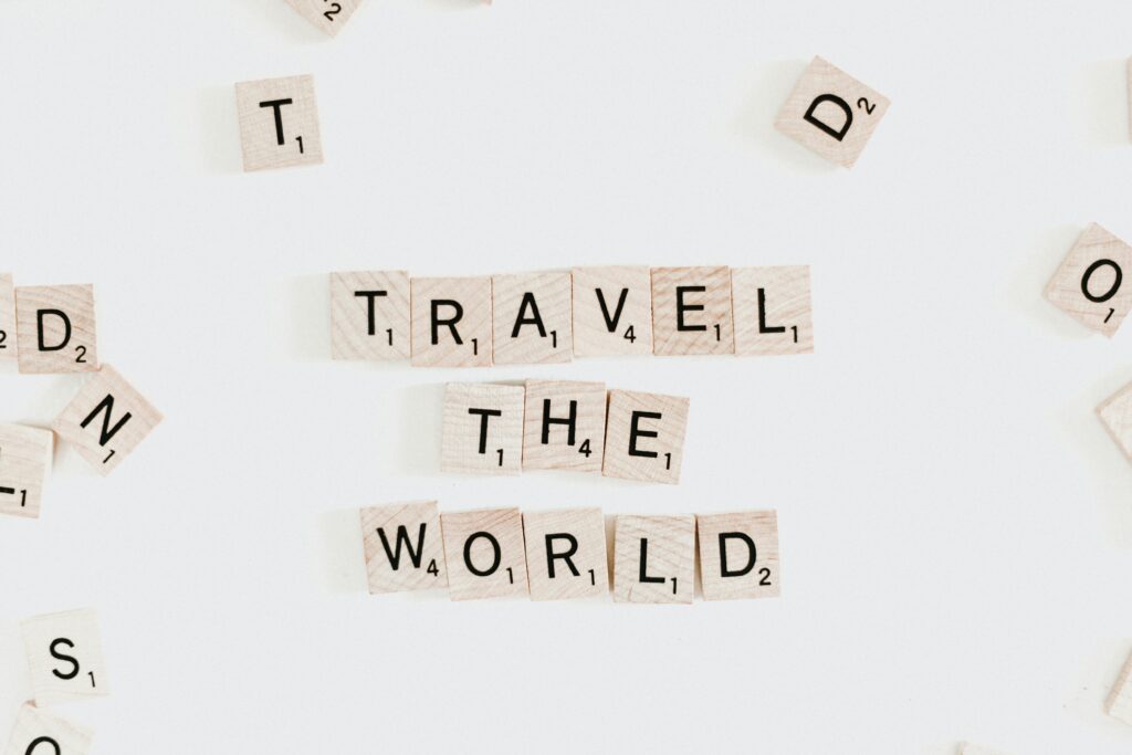 a group of wooden letters on a white surface