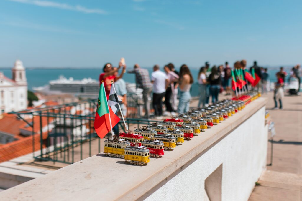 a group of toy trains on a ledge