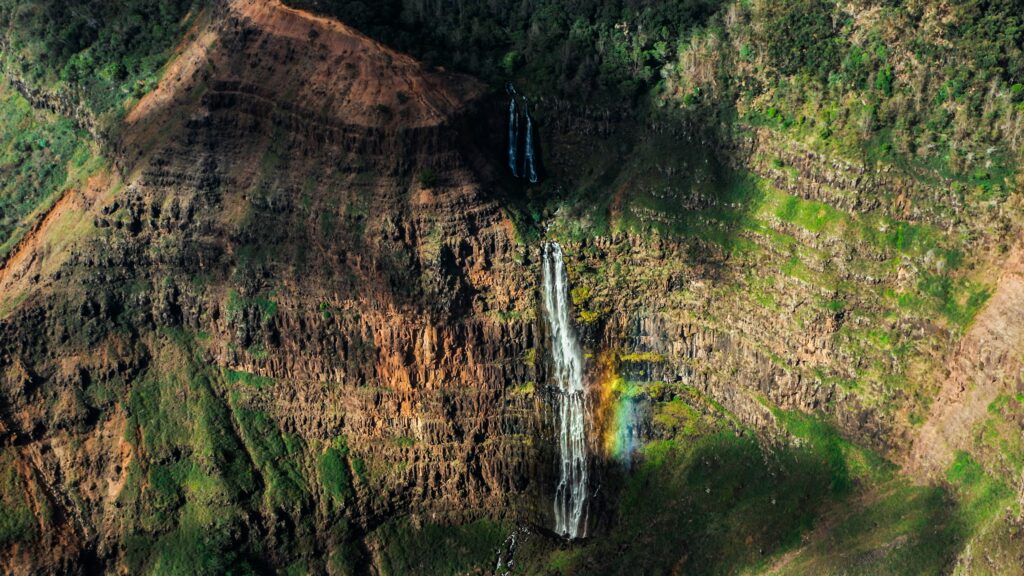 a waterfall in a mountain