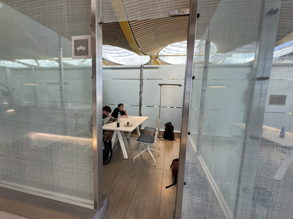 a couple of people sitting at a table