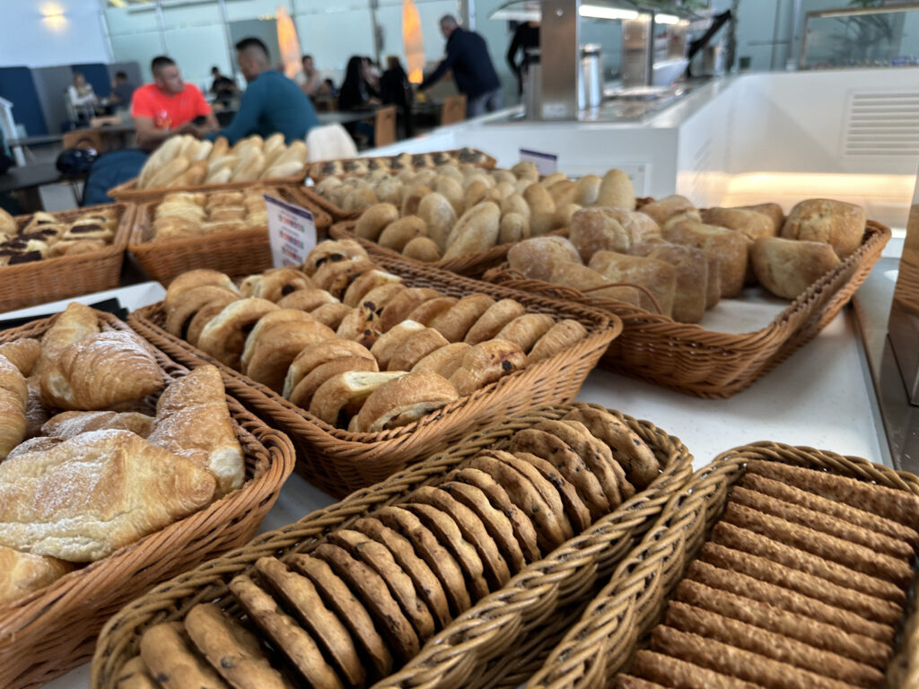 a group of baskets of bread and cookies