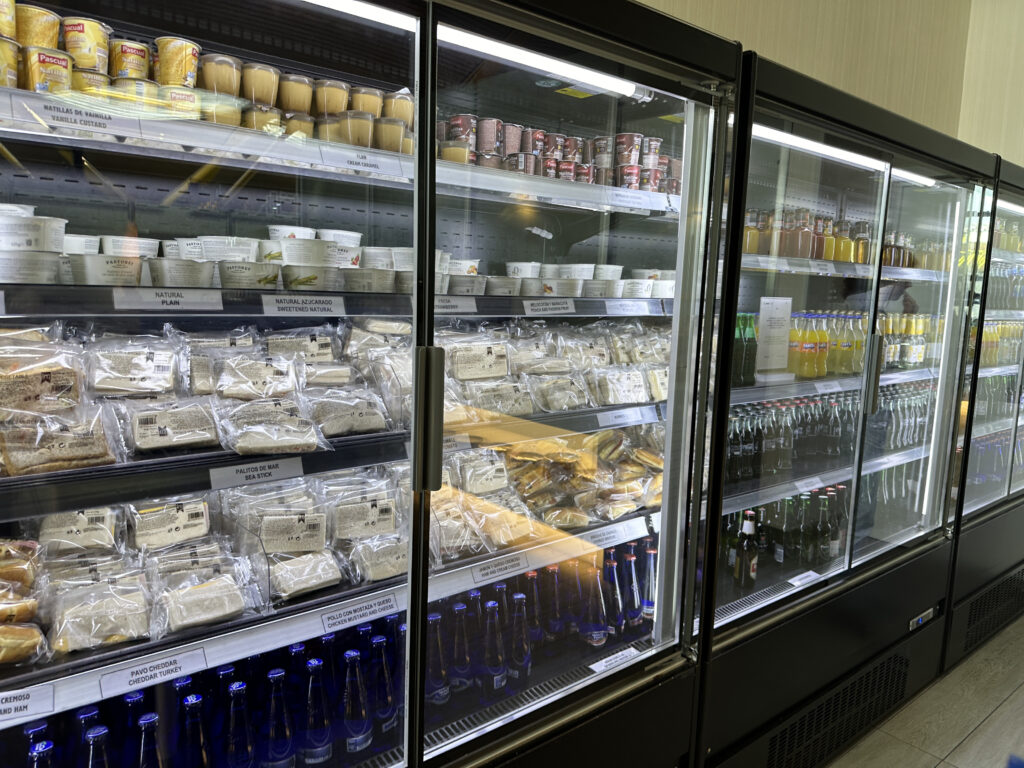 a refrigerator with glass doors