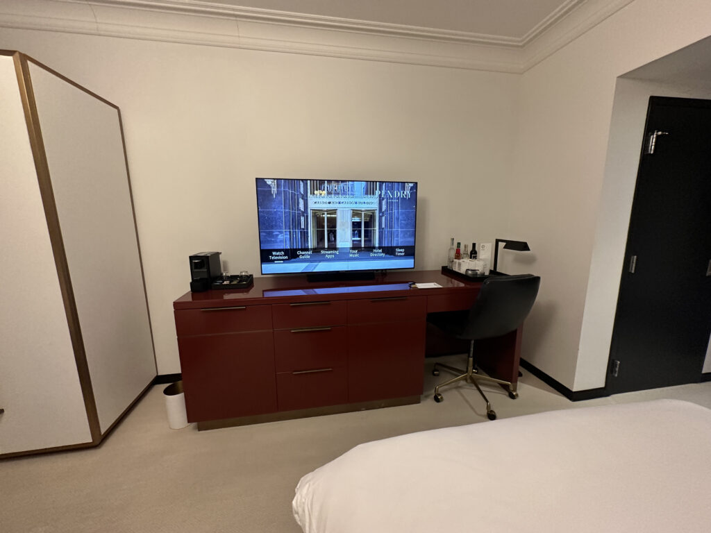 a tv on a desk in a room