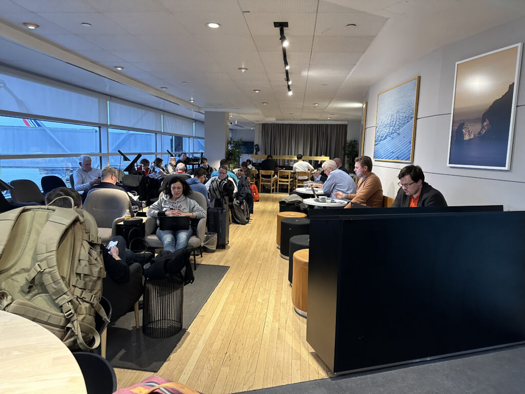 a group of people sitting in chairs in a room
