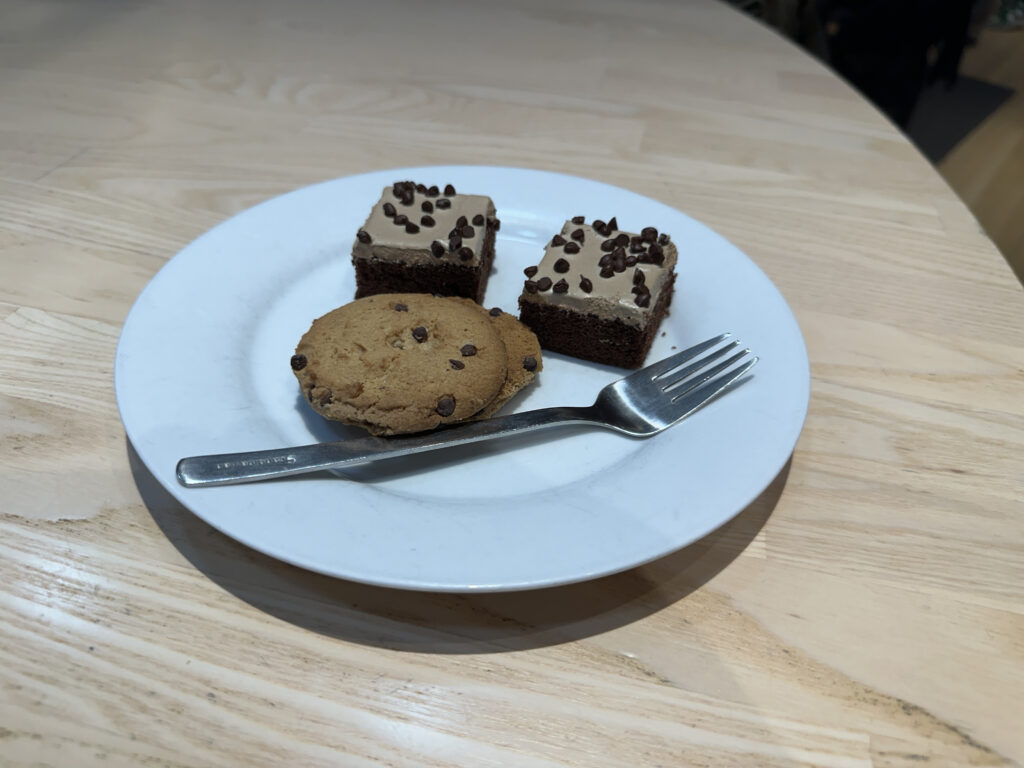 a plate of desserts and a fork