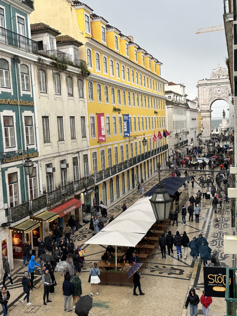 a group of people walking in a street