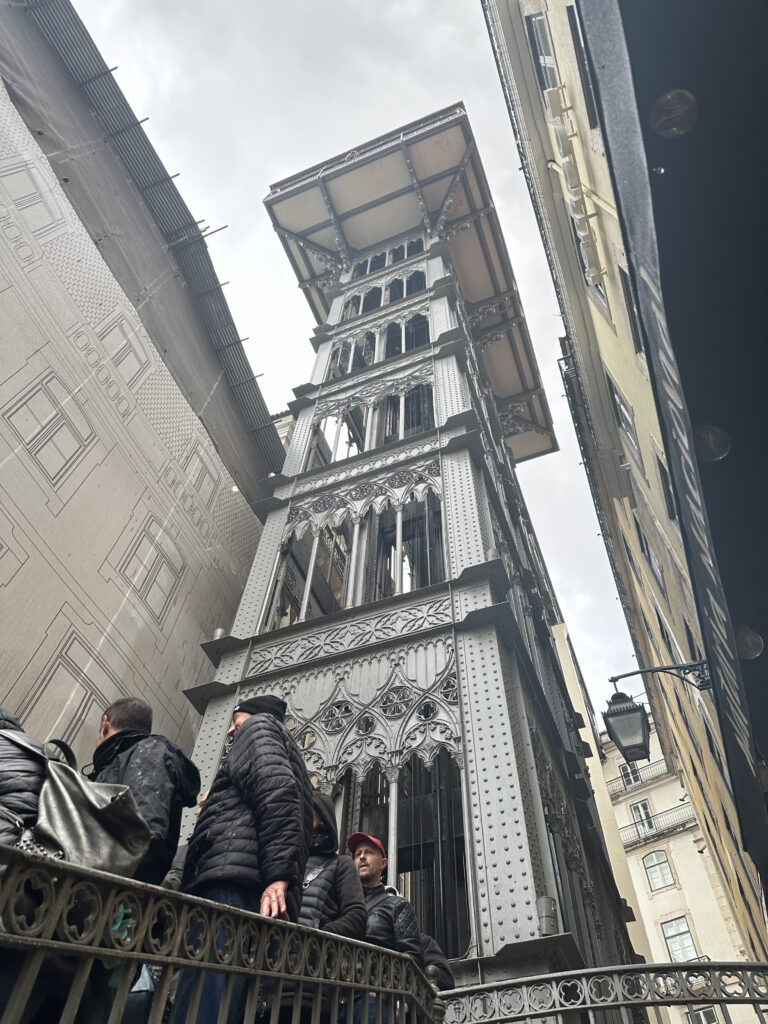 a group of people standing outside of a building