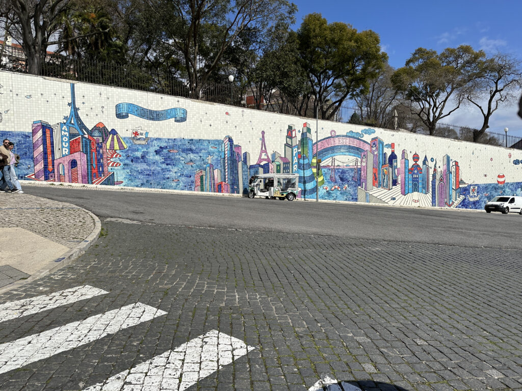 a wall with a mural on it