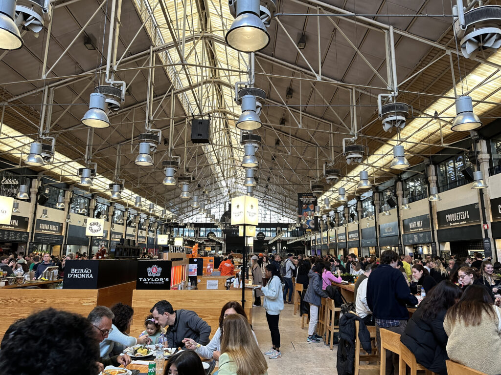 a group of people eating at a restaurant