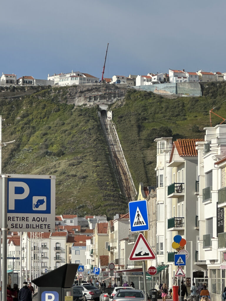 a city with a hill and buildings
