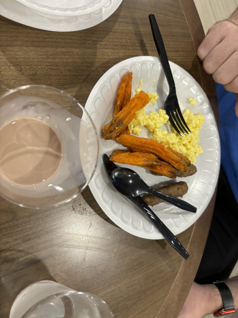 a plate of food with a fork and spoon