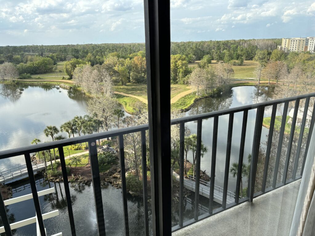 a view of a lake from a balcony