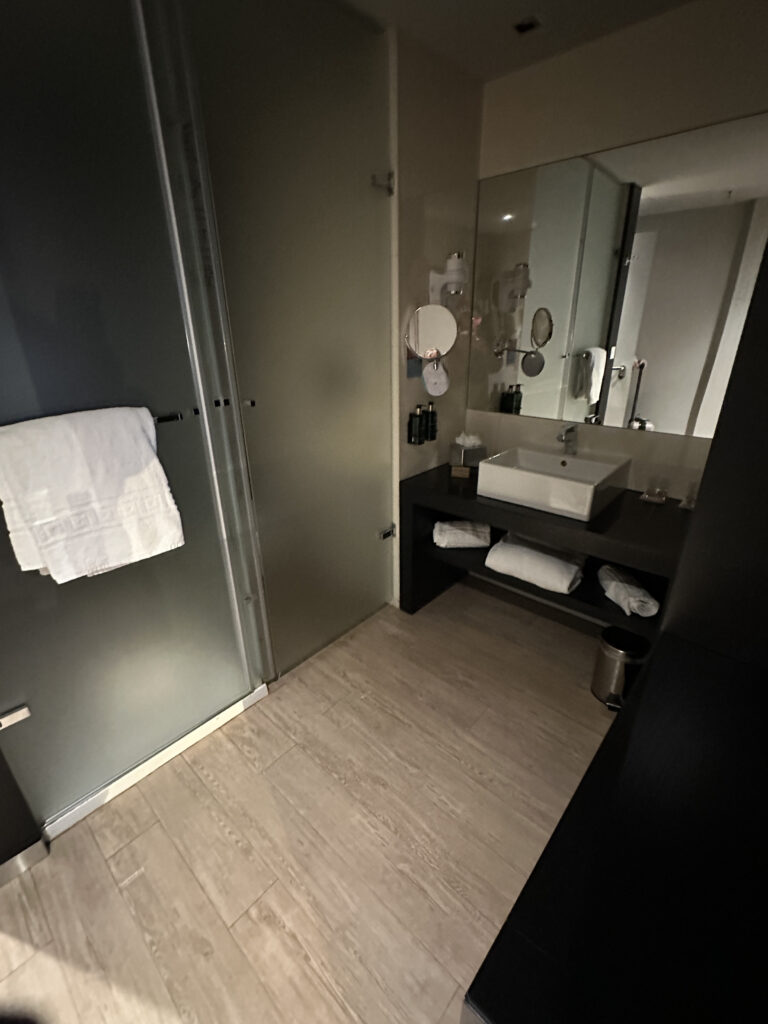 a bathroom with a sink and mirror