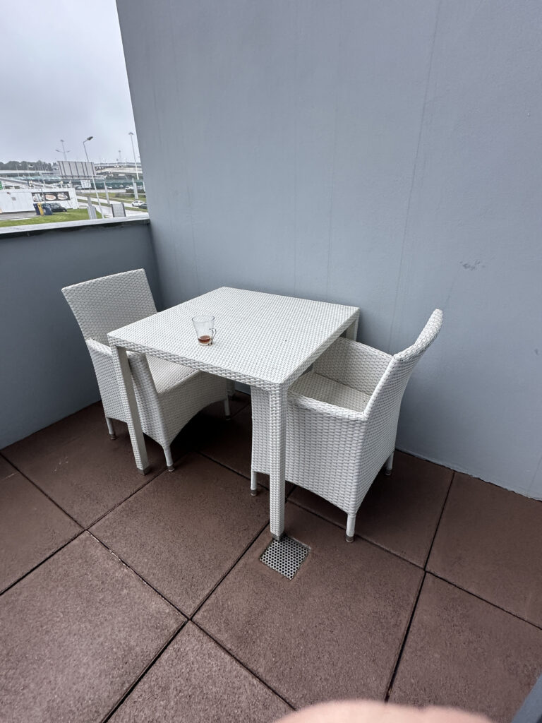 a table and chairs on a patio