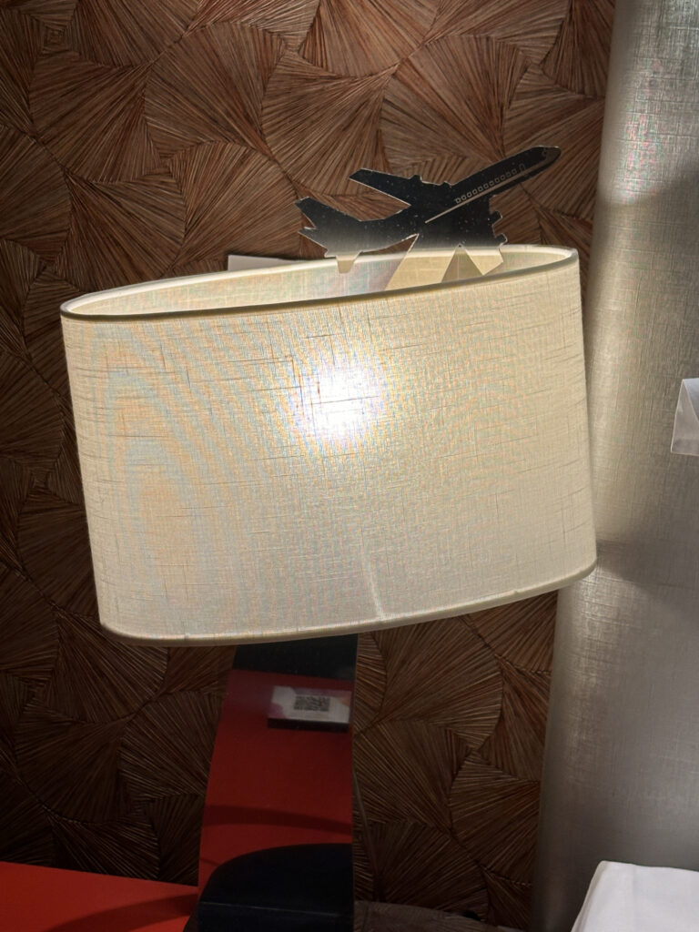 a lamp with a white shade