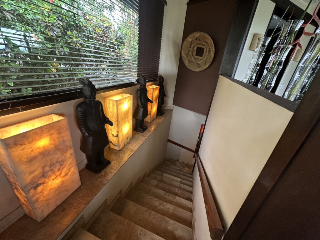 a staircase with statues on it