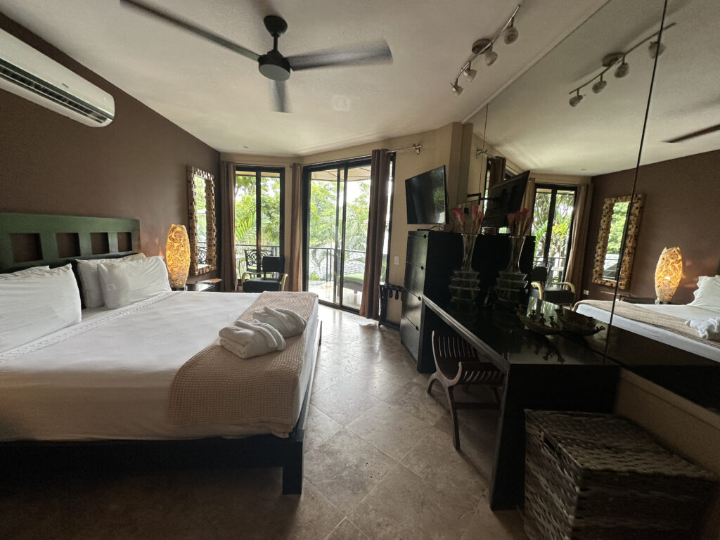 a room with a bed and a desk
