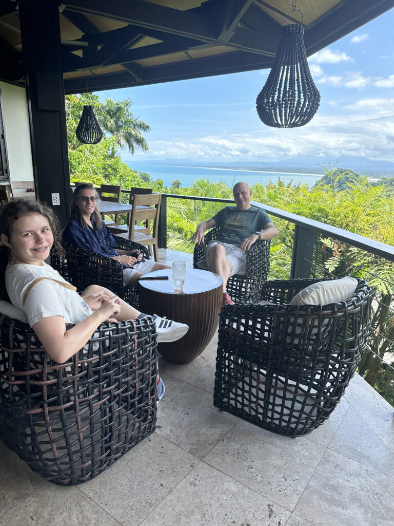 a group of people sitting on a patio