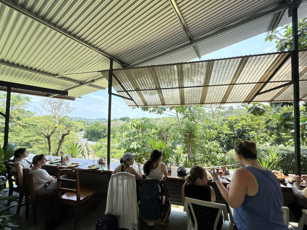 a group of people sitting at a table