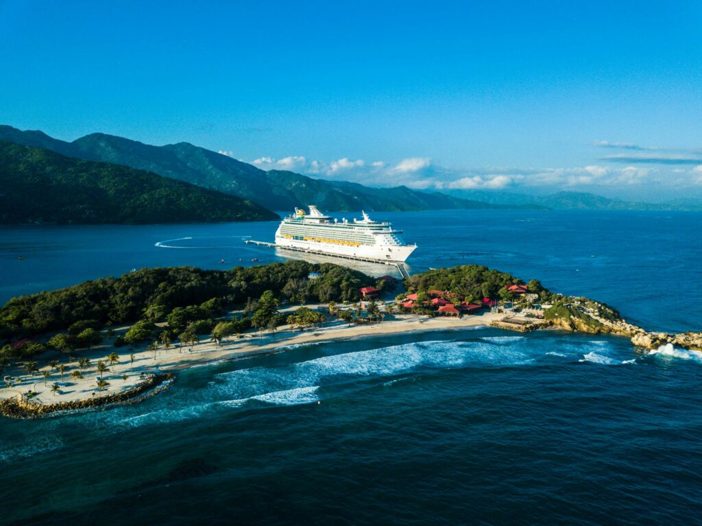 a cruise ship on a small island
