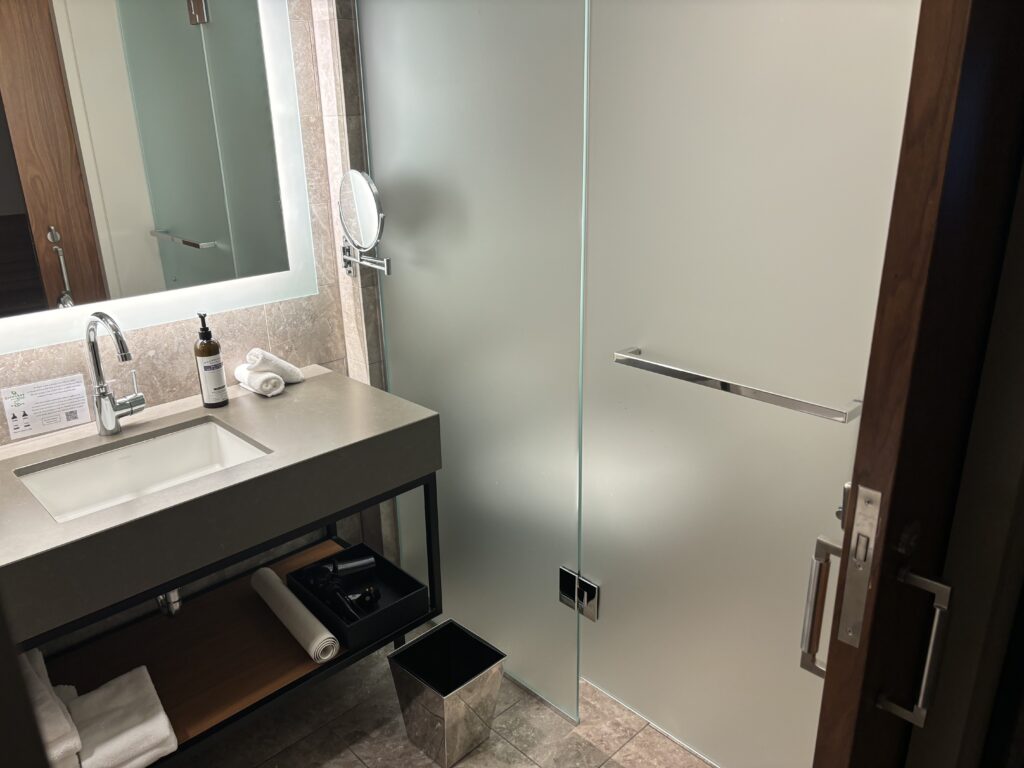 a bathroom with a glass door